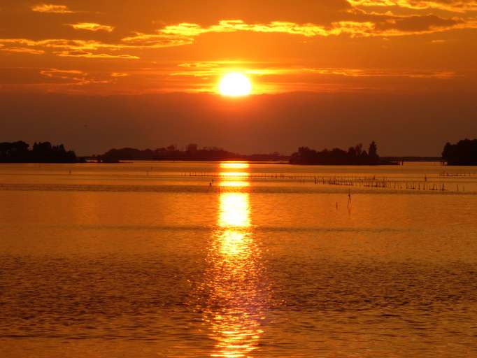 Sonnenuntergang über der Lagune von Grado